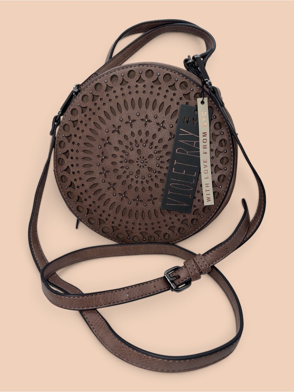 Round Perforated Crossbody Bag in Brown
